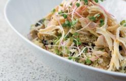 Shredded roast chicken, mushroom and couscous salad with a garlic lemon butter dressing